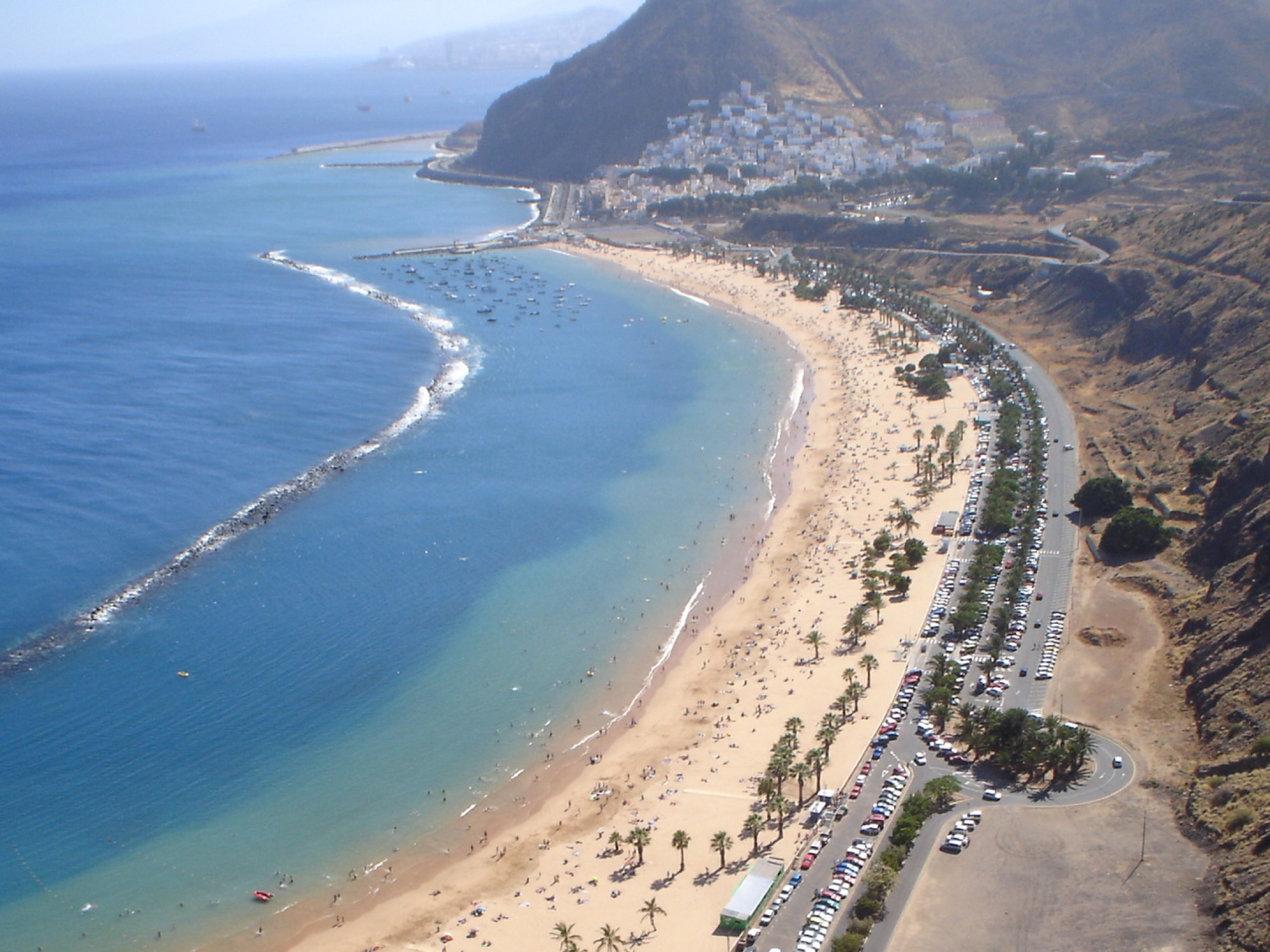 Las Teresitas from above — the golden crescent, the breakwater, and San Andrés on the hillside